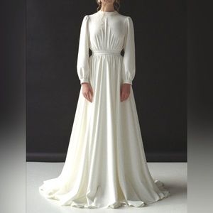 Gorgeous Full coverage wedding dress. Very nice material.